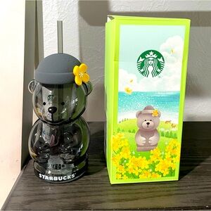 Starbucks glass bear with yellow flower on the hat authentic from Korea.